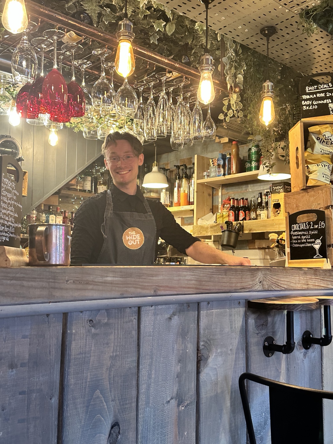 A warm welcome behind The Hideout bar