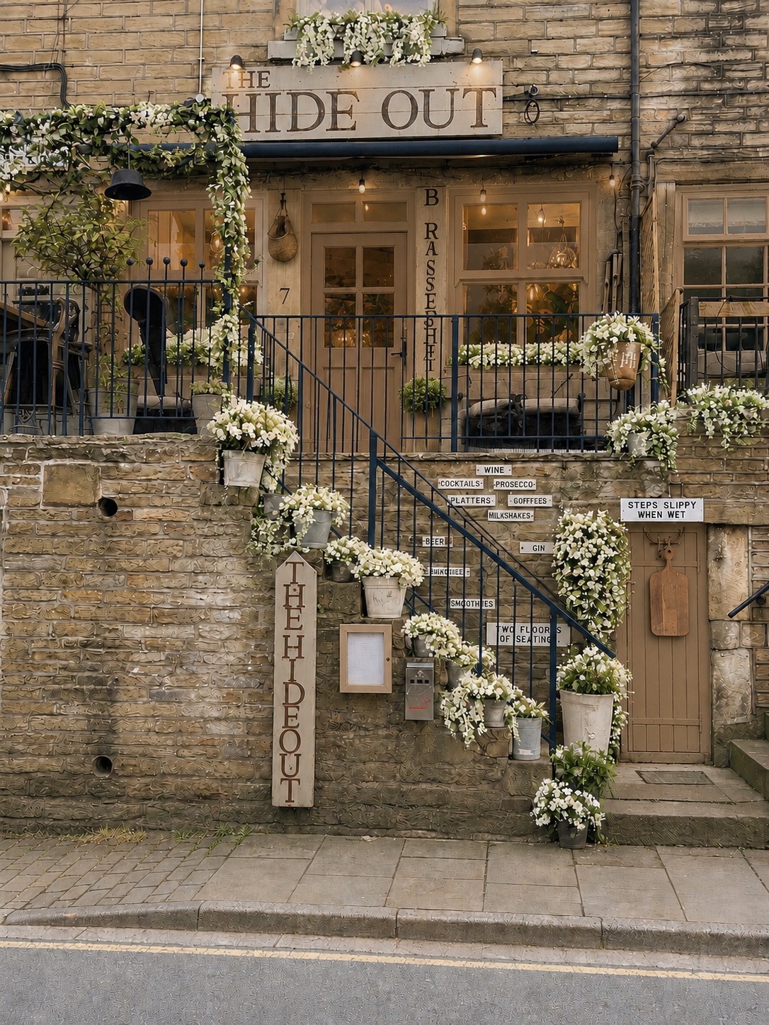 The flower-filled frontage of The Hideout